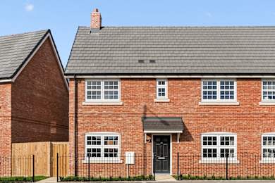 Floor Plan  A red brick house with a black door and windows.