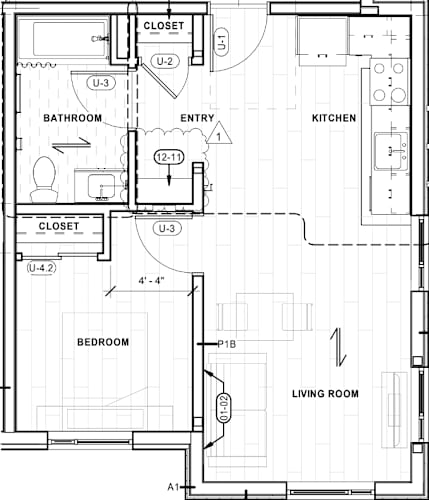 Floor Plan  A floor plan of a house with a living room, kitchen, two closets, a bathroom, and a bedroom.