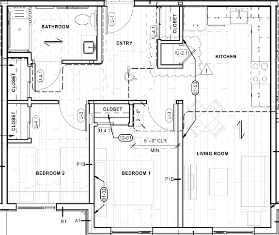 Floor Plan  A floor plan of a house with a living room, kitchen, two bedrooms, a bathroom, and two closets.