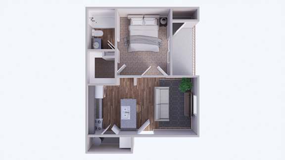 Floor Plan  A top-down view of a small apartment with a bed, a desk, a chair, and a kitchenette.