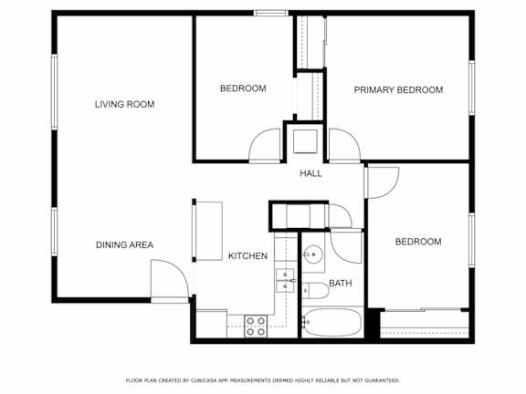 Floor Plan  A floor plan of a house with a living room, dining area, kitchen, two bedrooms, a hall, and a bathroom.