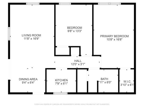 Floor Plan  A floor plan of an apartment with a living room, dining area, kitchen, hall, bath, and two bedrooms.