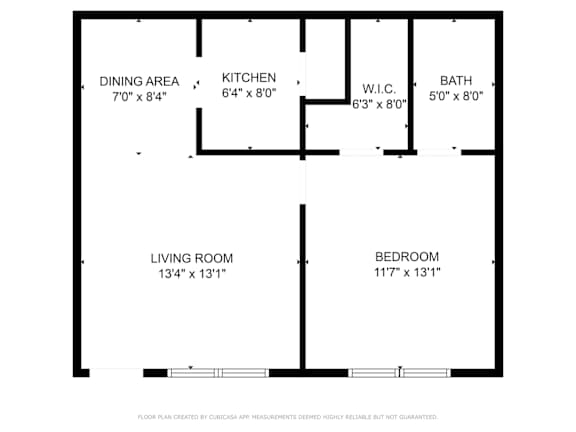 Floor Plan  A floor plan of an apartment with a dining area, kitchen, living room, bedroom and bathroom.
