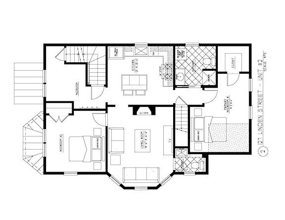 Floor Plan  A black and white image of a floor plan for a two-story townhouse.