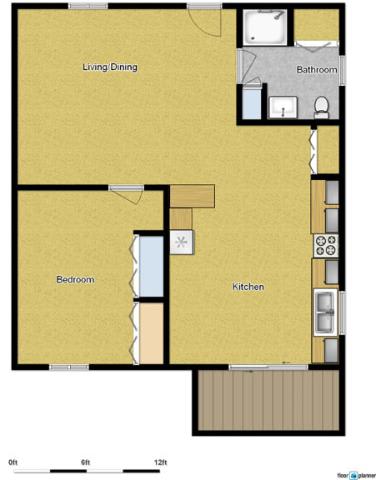 Floor Plan  A floor plan of a house with a living dining area, kitchen, bedroom, and bathroom.
