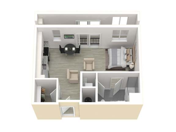 Floor Plan  A top down view of a small apartment with a living room, kitchen, and bedroom.
