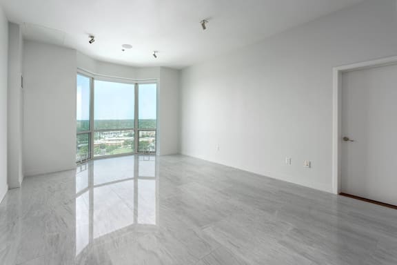 Floor Plan  A room with a large window overlooking a beach at Clayton on the Park Apartments, Clayton, MO, 63105