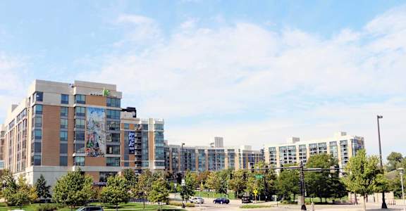 a view of a city with buildings and trees