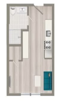 Floor Plan  A floor plan of a small apartment with a kitchen, living room, and bathroom.