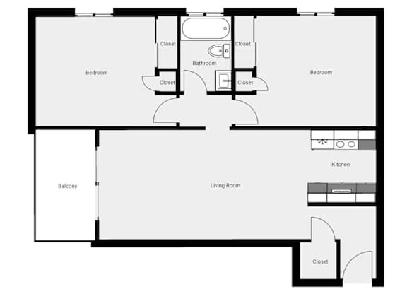 Floor Plan  A black and white floor plan of a house with two bedrooms, a living room, a kitchen, a bathroom, and a balcony.