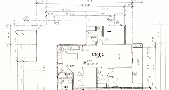 Floor Plan  A floor plan drawing for Unit C shows a layout with labeled rooms and dimensions.
