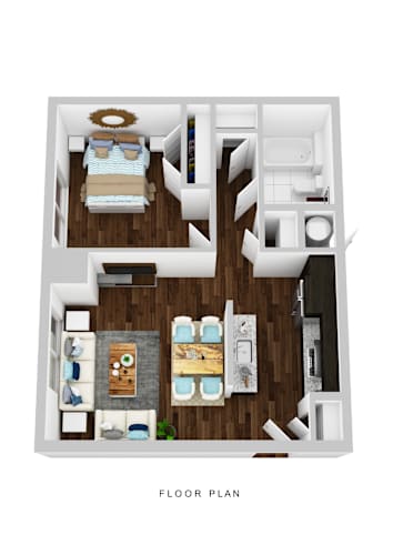 Floor Plan  A floor plan of a small apartment with a bedroom, living room, and kitchen.