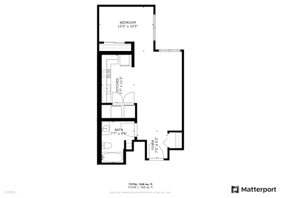 Floor Plan  A black and white image of a floor plan for a bedroom, bathroom, and kitchen.