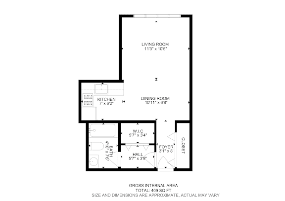 Floor Plan  A floor plan of a house with a living room, kitchen, dining room, and closet.