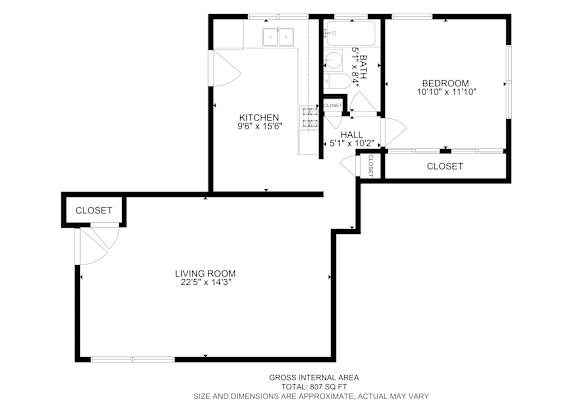 Floor Plan  A floor plan of a house with a living room, kitchen, and two bedrooms.