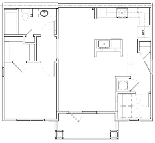 Floor Plan  A floor plan of a house with a kitchen, living room, and bathroom.
