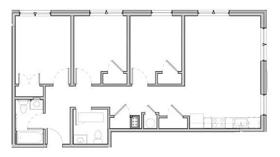 Floor Plan  Open kitchen and living space to one side of 3/2 of 1073 SF.