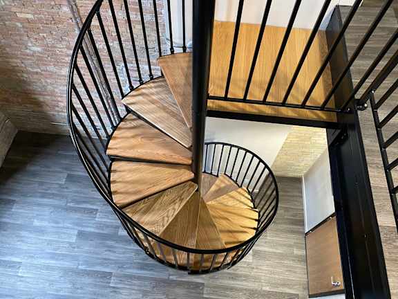 Floor Plan  the spiral staircase is made of wood and metal