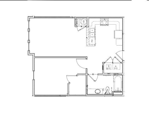 Floor Plan  A floor plan of a house with a kitchen, living room, and bathroom.