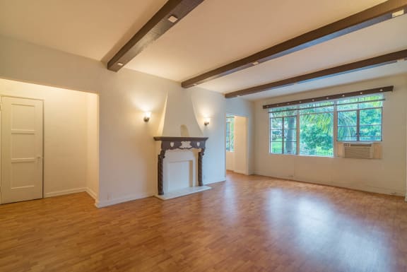 Floor Plan  Living area with high beamed celing,  and balcony access