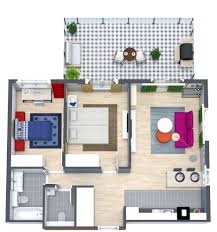 Floor Plan  A floor plan of a house with a kitchen, living room, and two bedrooms.