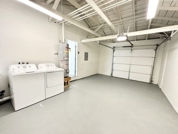 a laundry room with a washer and dryer