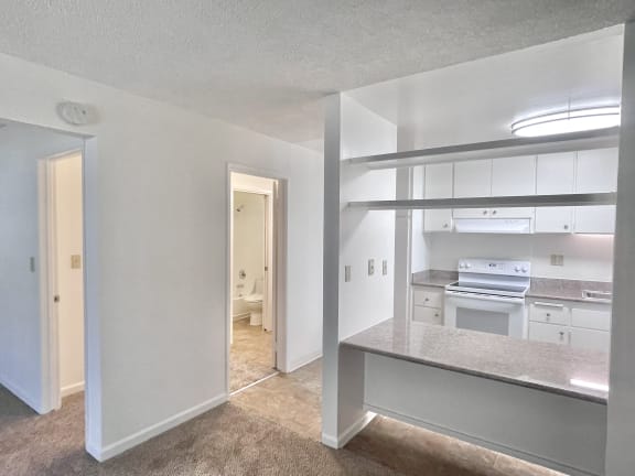 a bedroom with a bed and a mirror
