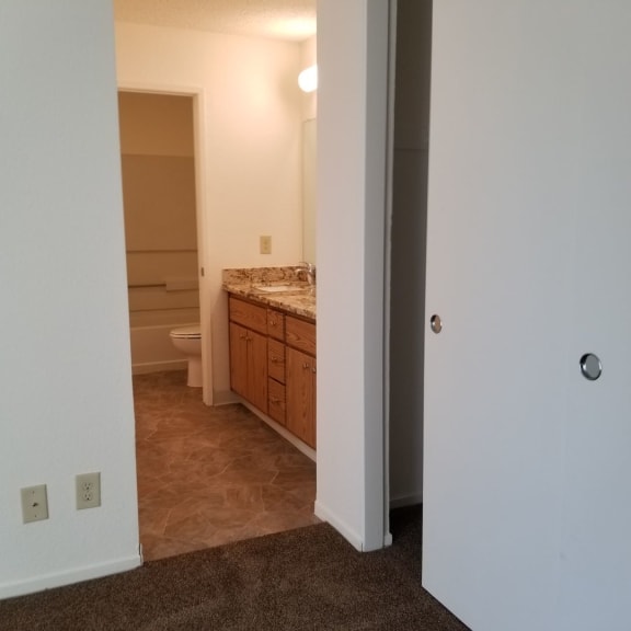 Tassajara 2x2.25 Large bedroom into bathroom entry featuring vanity (basic)
