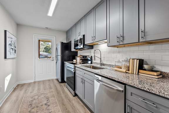 kitchen with cabinet at West Oak Apartments, North Carolina