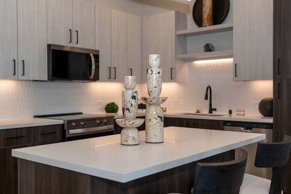 A kitchen with quartz countertop