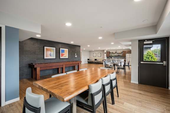 Clubroom with Shuffleboard at Alo Apartments in Buffalo MN