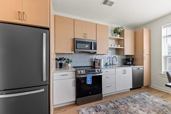 Open Shelving with Under-Cabinet Lighting Hawkins Press at Hawkins Press Apartments, North Carolina