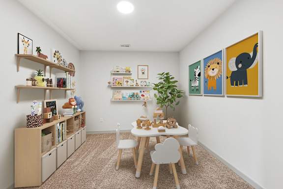 A room with a white table and chairs, a bookshelf, and a painting of a lion and an elephant on the wall.