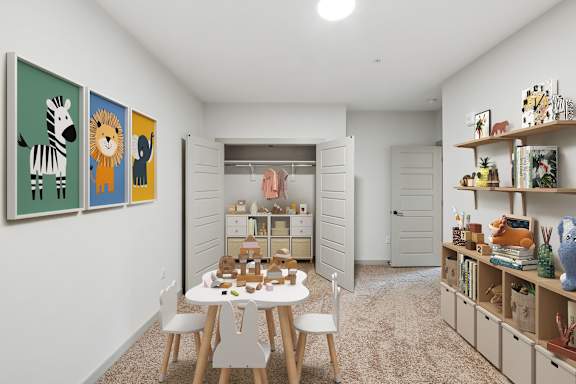 A room with a white table and chairs, a bookshelf, and a wall with animal paintings.