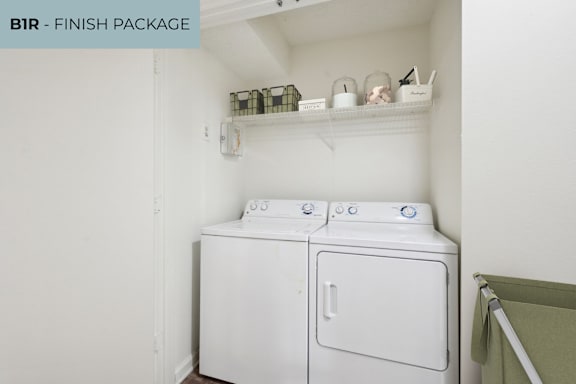 A laundry room with a washer and dryer.