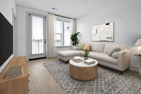 a living room with a couch and a coffee table at Metropolitan at the Riverwalk, Wilmington, NC