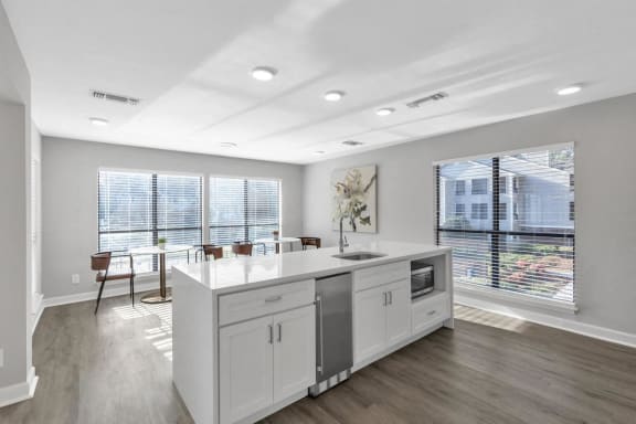 an open kitchen and dining room with a large window at Brampton Moors, North Carolina, 27513