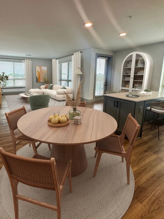 a living room and dining room with a table and chairs  at South and Hollis, Charlotte, NC