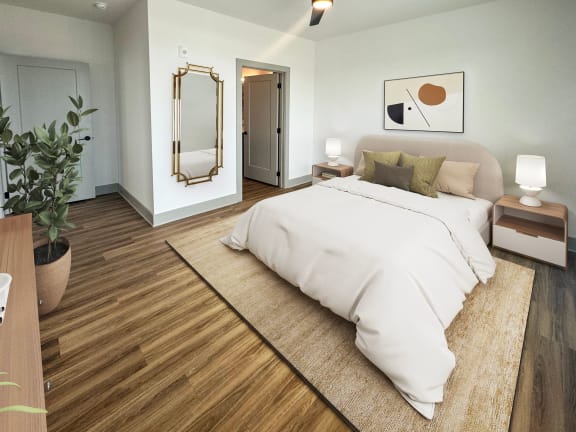 a bedroom with a bed and a rug  at South and Hollis, North Carolina, 28209