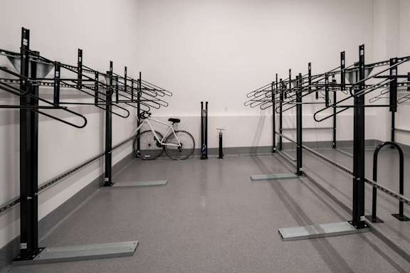 A bicycle is parked in a bike rack at Jayde Parkside Apartments, Washington