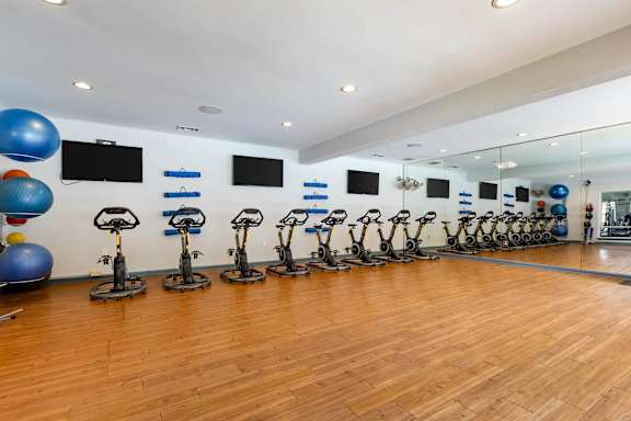 A gym with exercise bikes at Crestline Cary, North Carolina