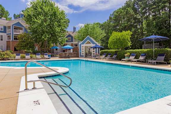 Pool With Lounge Chairs at Crestline Cary, Cary, NC 27511