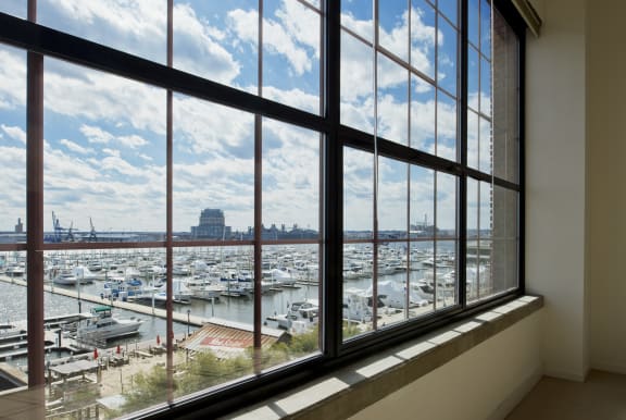 a view of the harbor from a window in a building at Tindeco Wharf, Baltimore, MD 21224