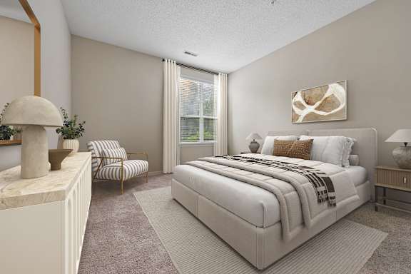 A bedroom with a large bed and a chair.