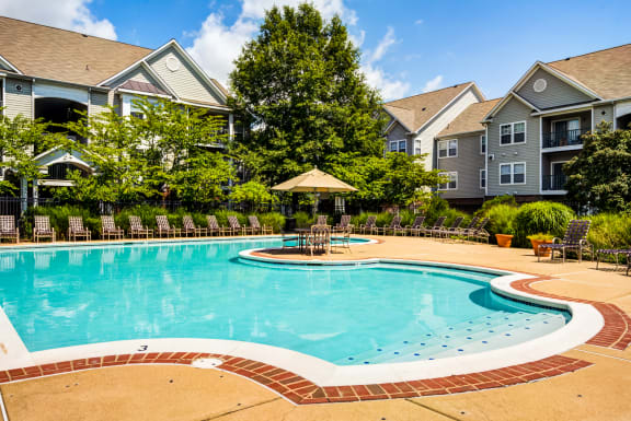 the preserve at ballantyne commons community swimming pool with apartment buildings at The Fields at Lorton Station, Lorton, 22079