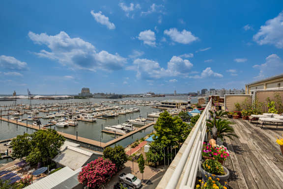 A marina with boats docked at Tindeco, Wharf, Baltimore, MD 21224