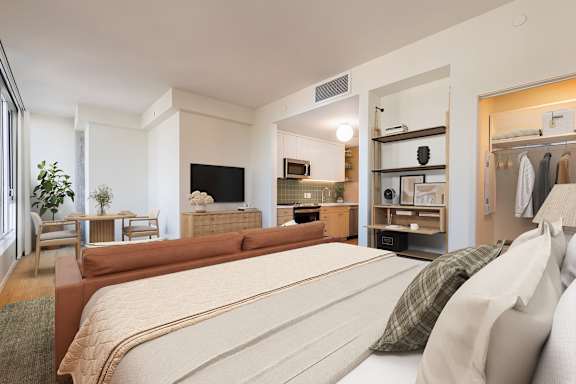 Studio apartment with integrated kitchen and living space at Allied Harbor Point Apartments, Baltimore