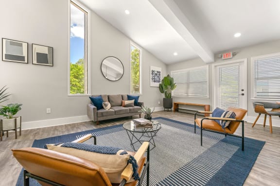 Leasing office with couches and chairs and a table at Concord Crossing in Smyrna, Georgia