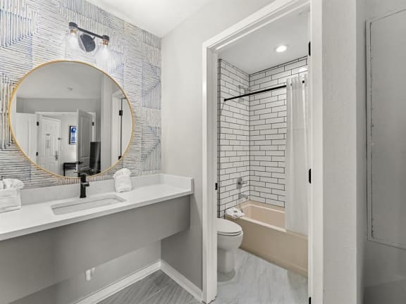 a bathroom with a sink and a toilet and a shower at 505 Collection, Atlanta, GA, 30305