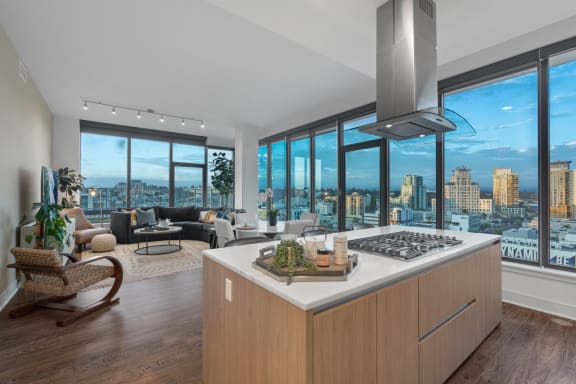 Modern wide-plank wood-style flooring throughout  at Stanza Little Italy,  92101